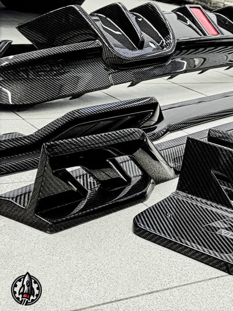 BMW X6M получил спортивный выхлоп и карбоновый обвес MEGALODON